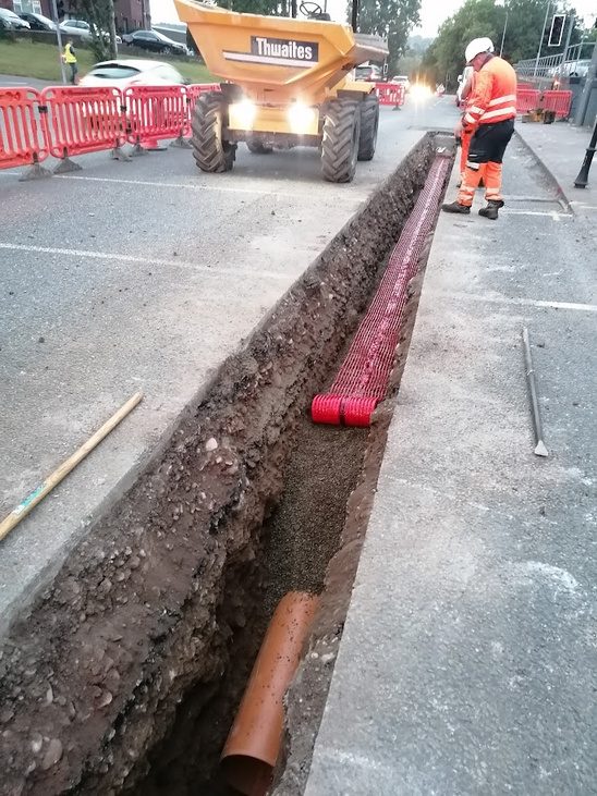 Open trench with ducting and pipework on a rising main installation in Cork